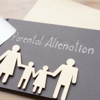 Parental alienation is shown using the text